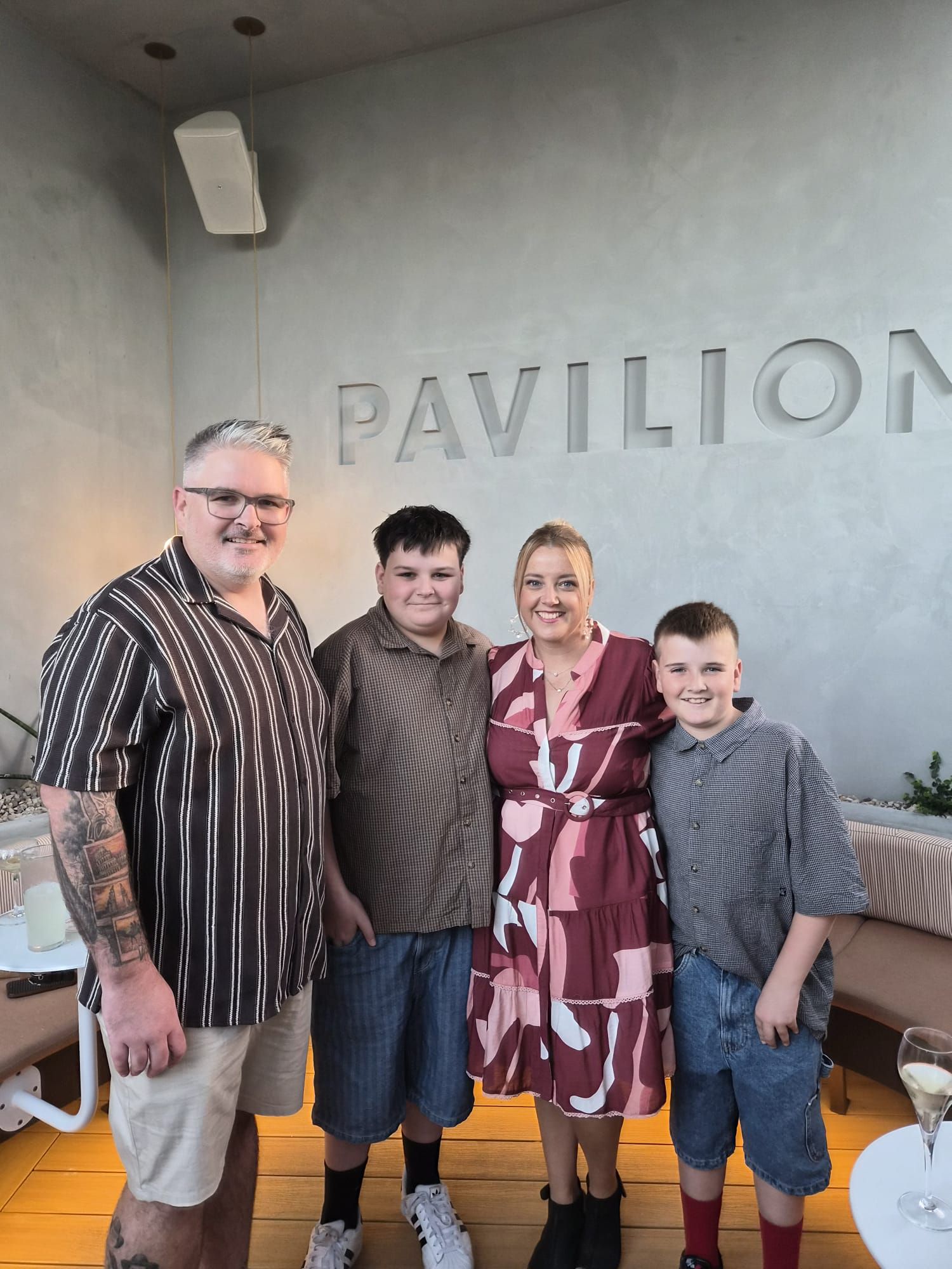 Aaron White with his wife and two sons